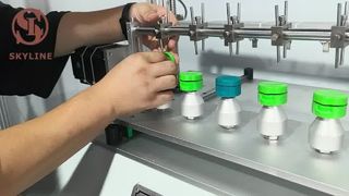 सौंदर्य प्रसाधनों के लिए कैप हिंज परीक्षक